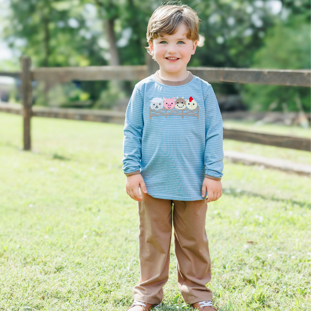 little boy wearing the farm friends set
