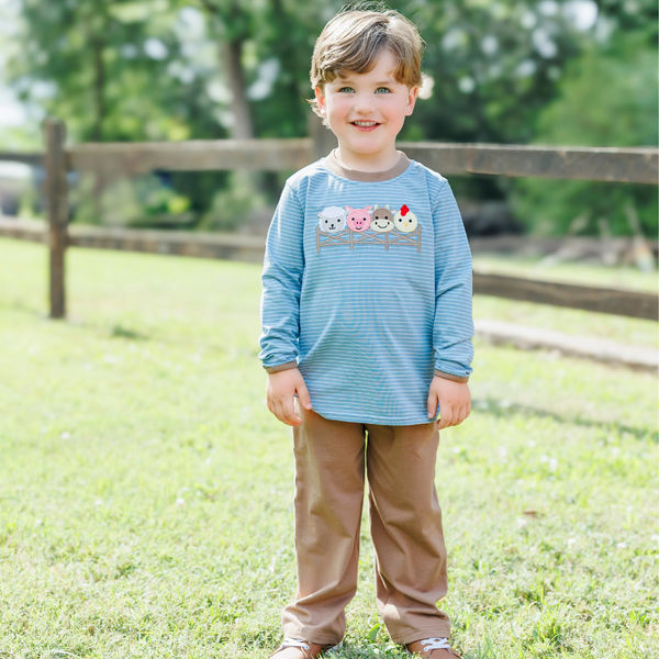 little boy wearing the farm friends set
