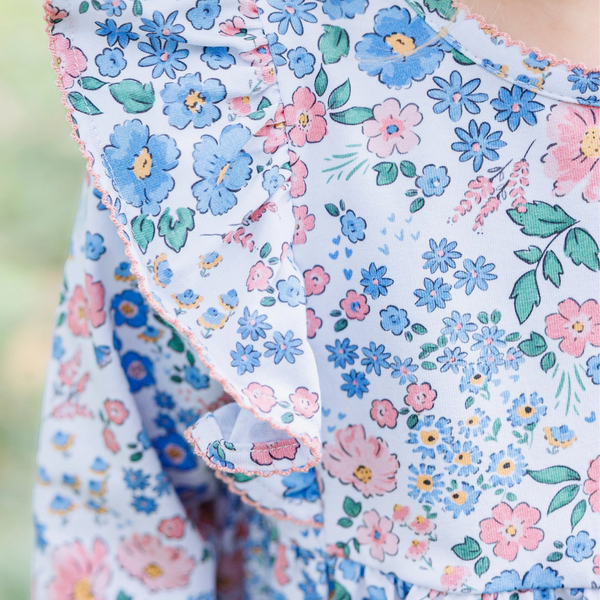 Floral patterned fabric with blue, pink, and green colors.
