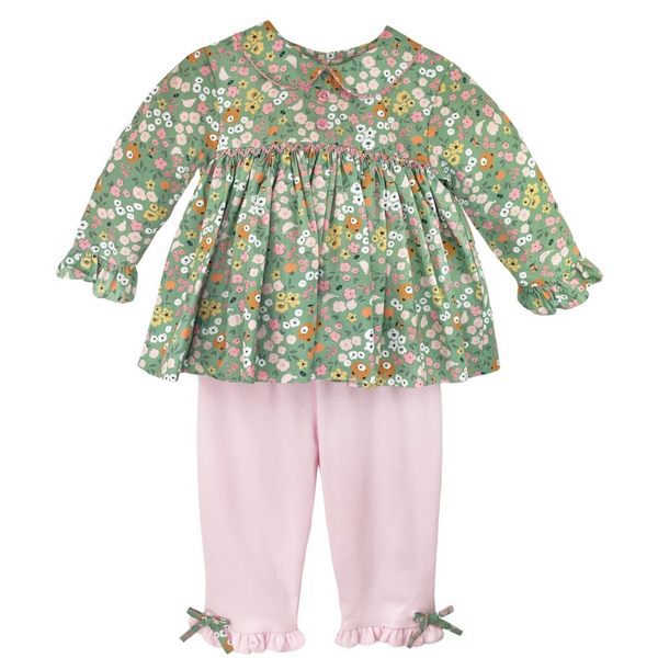 green floral print with little bear heads and a solid pink knit pant with matching bows at the ankle