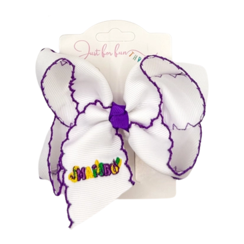 White and purple bow with colorful text on a white background
