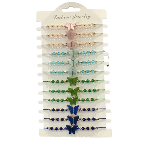 A product image showing a set of 12 adjustable butterfly bracelets displayed on a white cardboard hanger. The bracelets are arranged in pairs and feature various colored beads and a butterfly charm, with colors including pink, light blue, green, and dark blue.