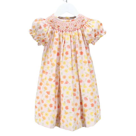 Pink floral smocked bishop dress with puff sleeves and gathered skirt on a white hanger.