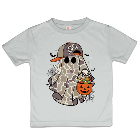 Kids Halloween t-shirt featuring a camo ghost wearing a “Candy Hunter” cap, holding a pumpkin candy bucket with bats and spider webs.