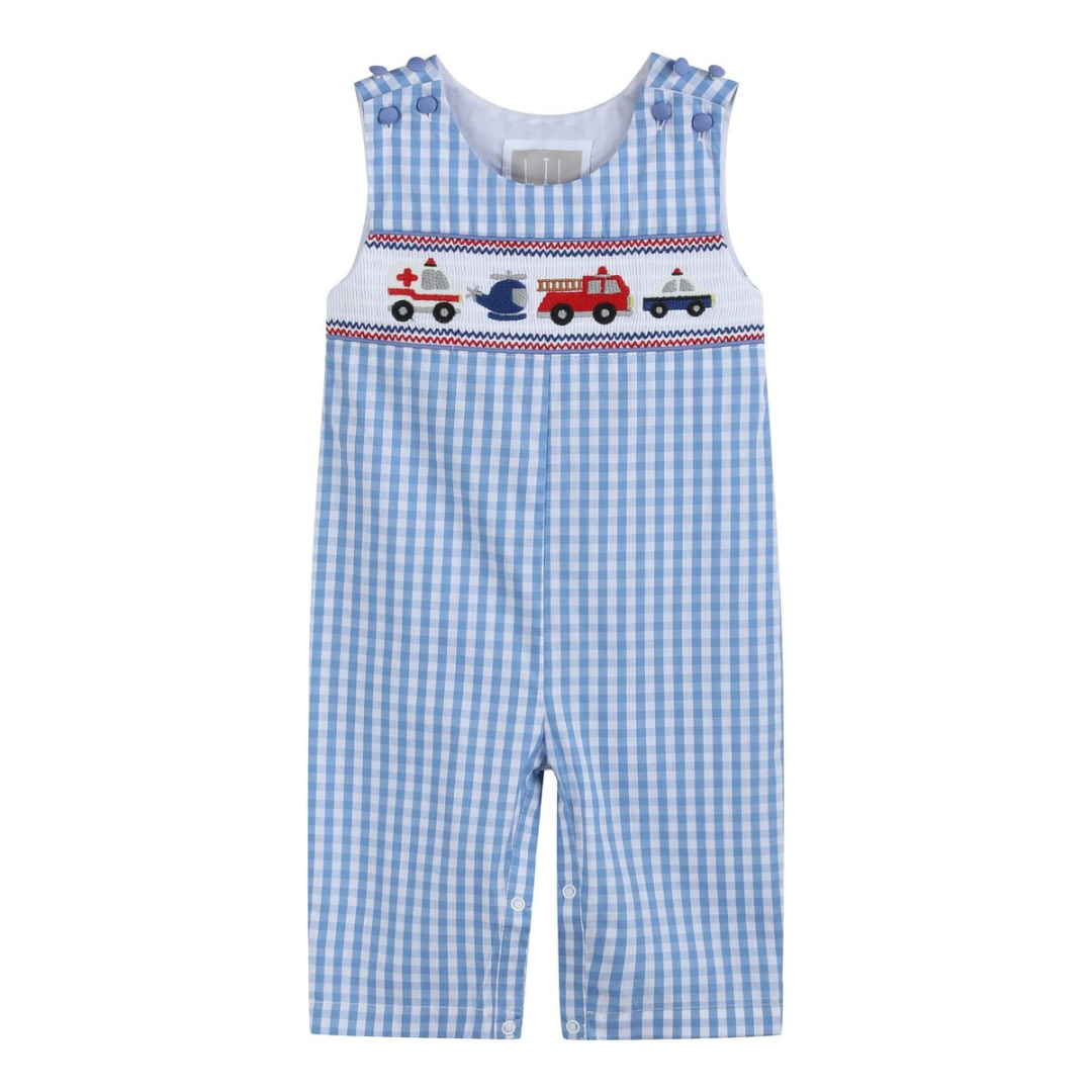 Blue gingham overalls with embroidered emergency vehicles smocked across the chest, shown from the front.