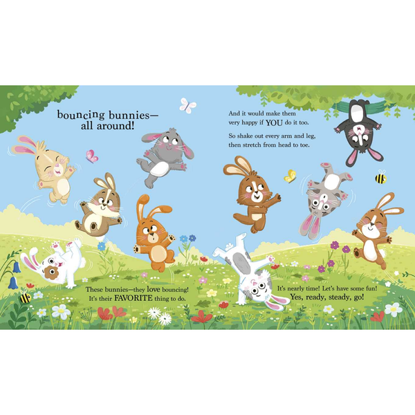 Illustration of bunnies bouncing on a grassy field with a blue sky.