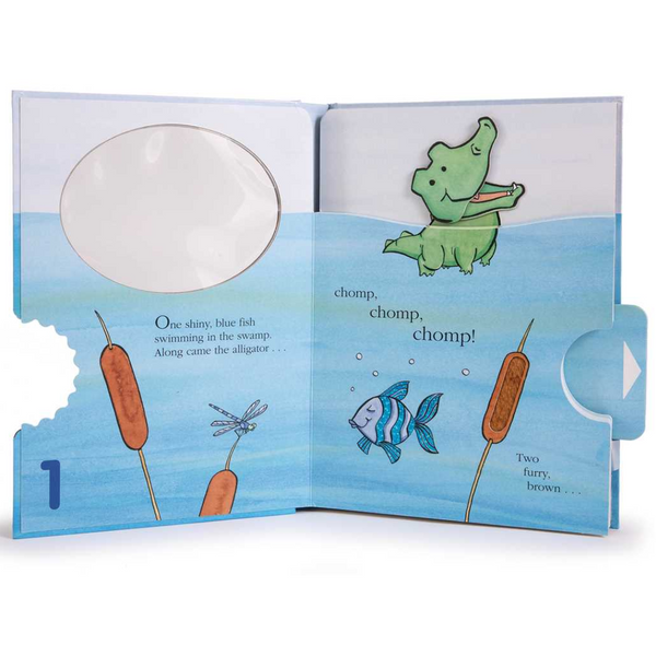 Inside spread with blue fish, cattails, and chomp tab in action.