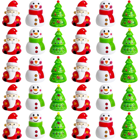 Rows of mini Christmas-themed toy cars featuring Santa, snowman, and Christmas tree designs in bright red, green, and white.