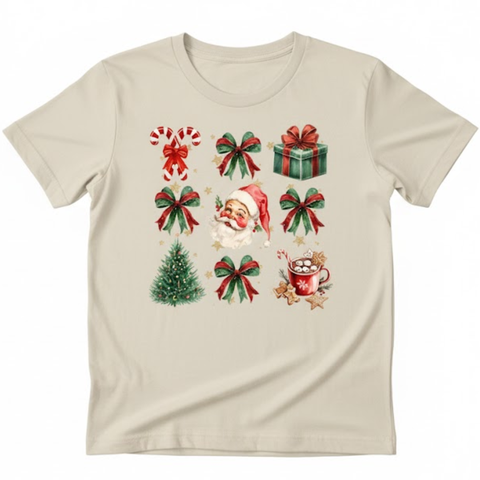 Kids' beige Christmas t-shirt featuring a grid of holiday illustrations: Santa Claus head, red and green bows, candy canes, a present, a Christmas tree, and a hot cocoa mug.