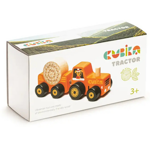 “Eco-friendly wooden toy tractor with detachable magnetic trailer and hay bale by Kubika, painted in orange with black wheels.”