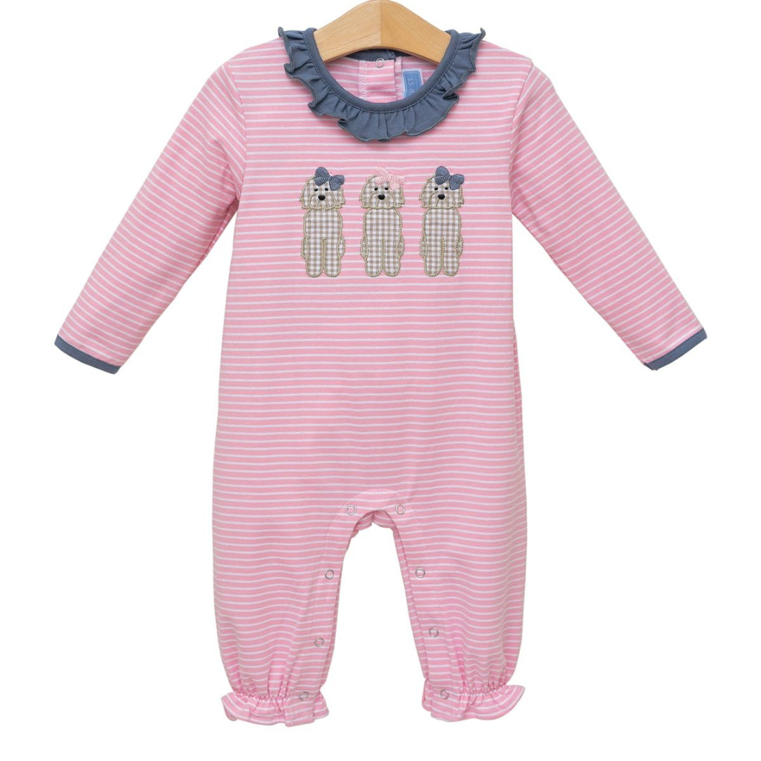 Pink striped baby romper with three puppy appliqués, navy ruffle collar, and leg ruffles for girls.

