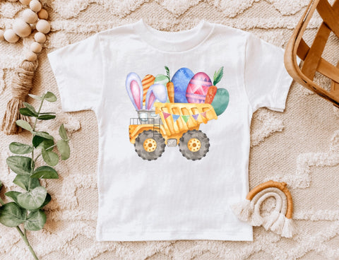 white boy tee with sublimation print of a dump truck carrying easter eggs and carrots and bunny ears sticking out