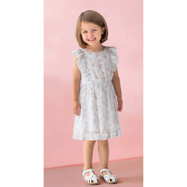 live photo of a little girl wearing the Eden Dress