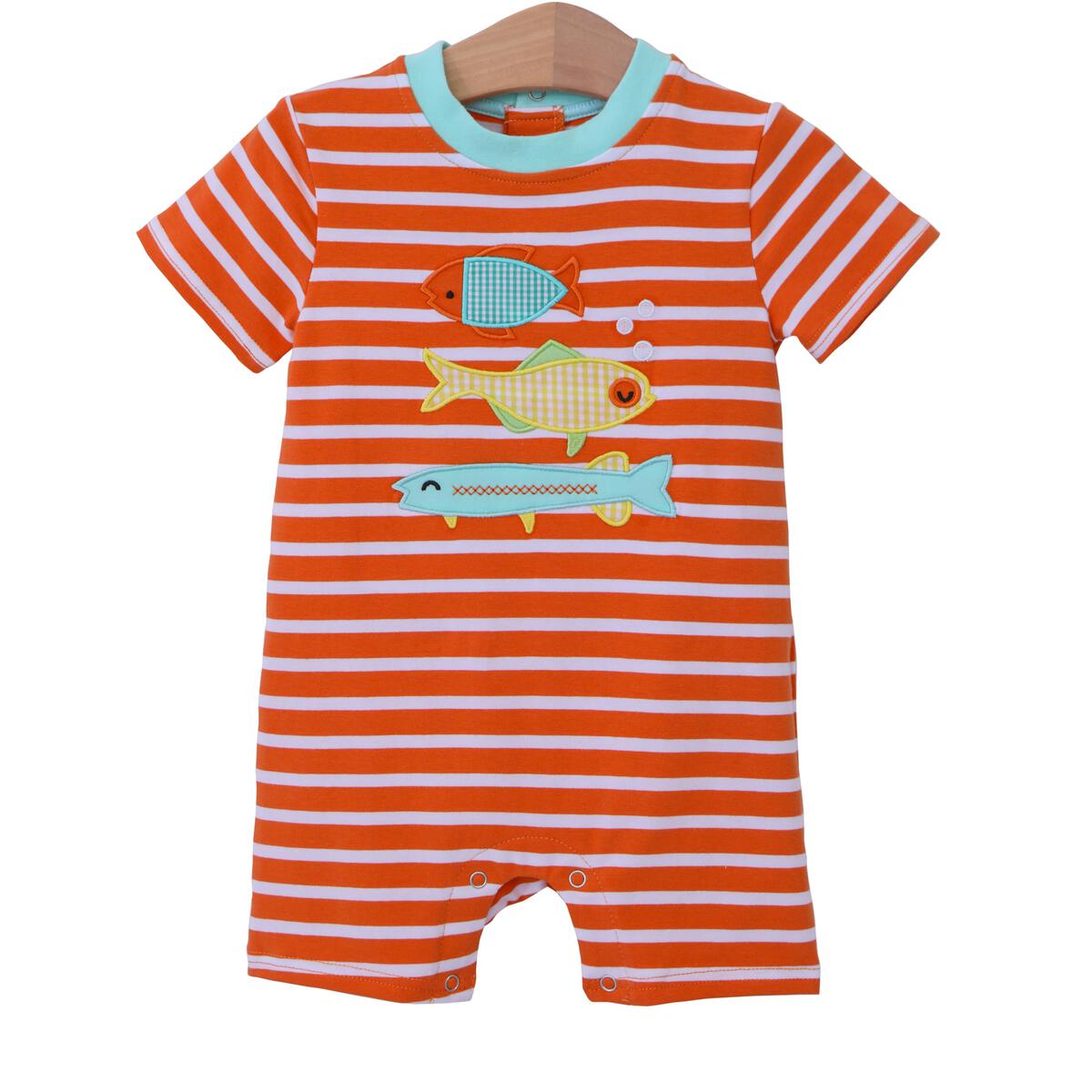Orange and white stripe knit boy romper trimmed at the neck with a light blue and trio fish applique on the front