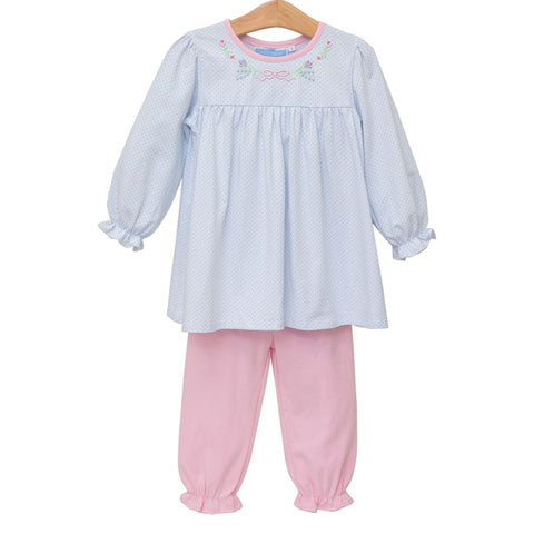 Girls’ blue floral embroidered tunic with pink ruffle pants set on hanger

