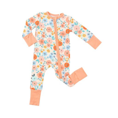 cream coverall with orange and blue flowers