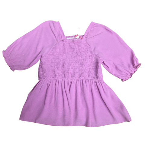 Girls’ fuchsia smocked puff sleeve top with flowy hem and elastic cuffs.