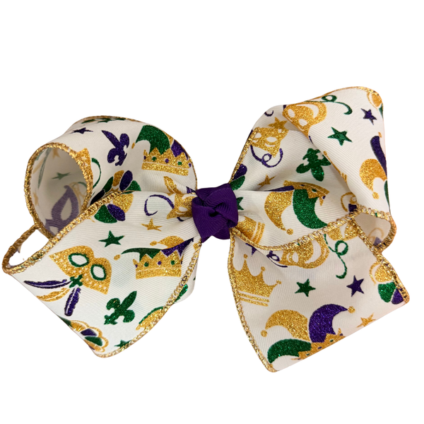 Mardi Gras hair bow with purple, green, and gold crowns, fleur-de-lis, and masks, finished with gold trim and attached to a metal barrette clip