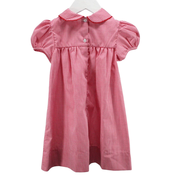 Back of red gingham girl's dress with button closures and gathered skirt.