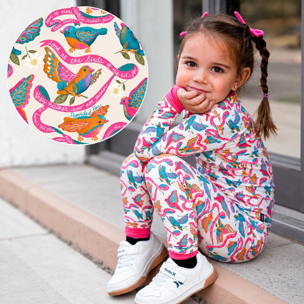 A girl modeling the cute He Provides hot pink pajama set. 