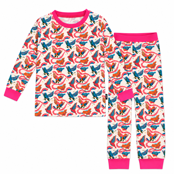 Kids bamboo pajama set with colorful bird print and pink trim on long sleeve top and pants