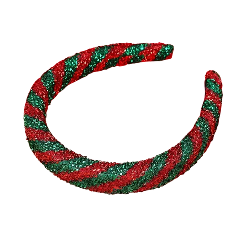 A U-shaped headband covered in alternating diagonal stripes of red and green glitter, resembling a candy cane, on a white background.