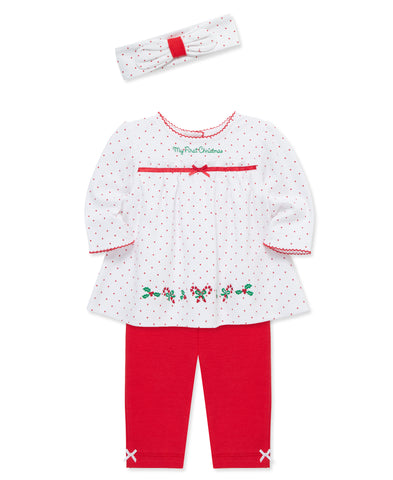 white and red dotted shirt with a matching headband and matching red pants