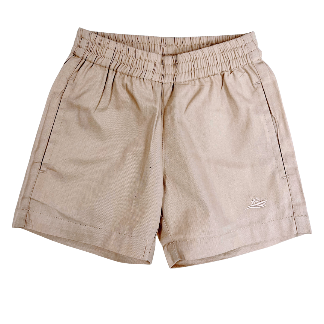 elastic waist pull on boys shorts with front side pockets in a light khaki color