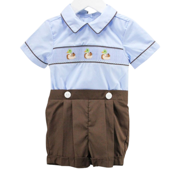 Baby boy's blue top and brown pleated shorts with duck smocking across the chest

