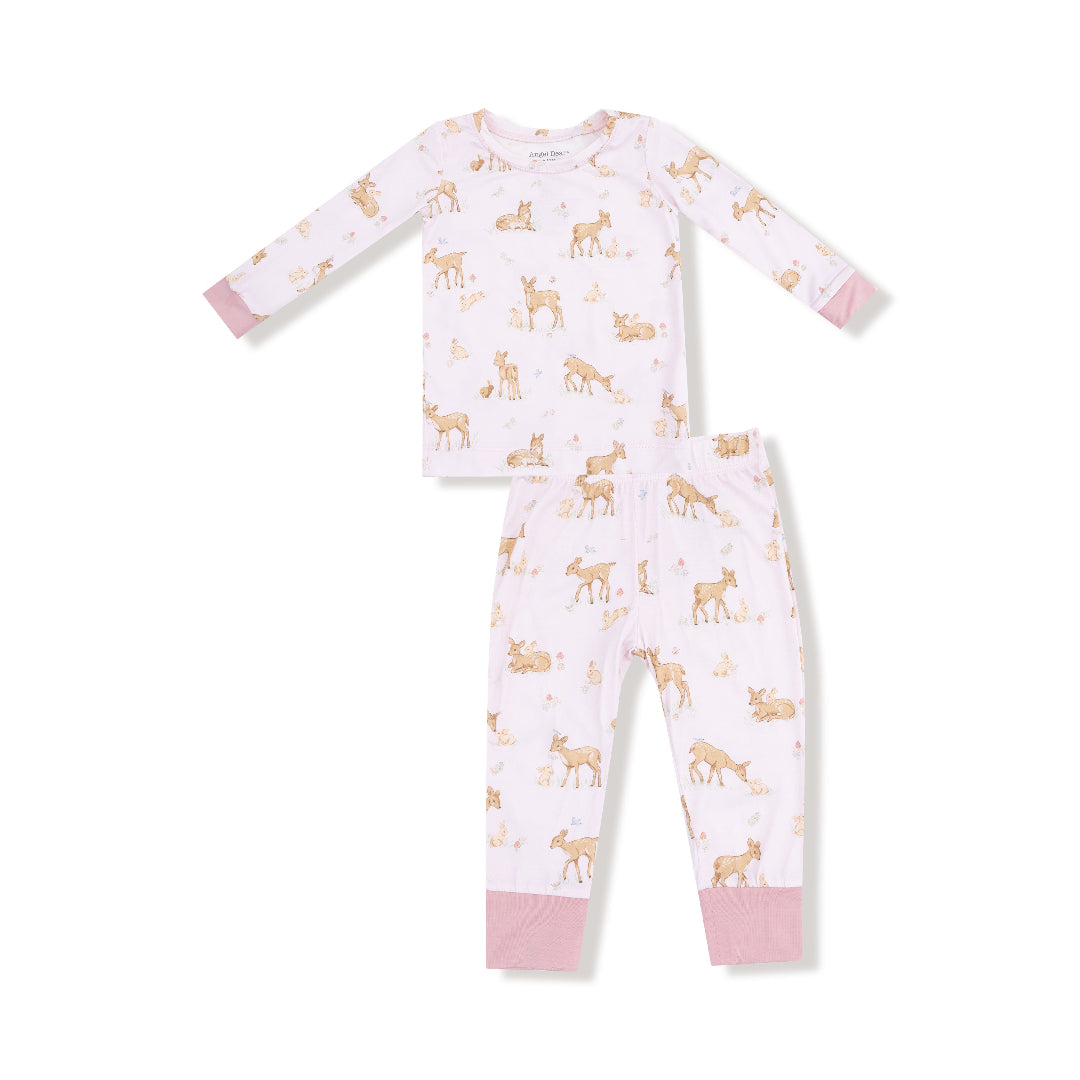 Two-piece pink children’s loungewear set with fawn and bunny forest print, featuring long sleeves and soft mauve cuffs.









