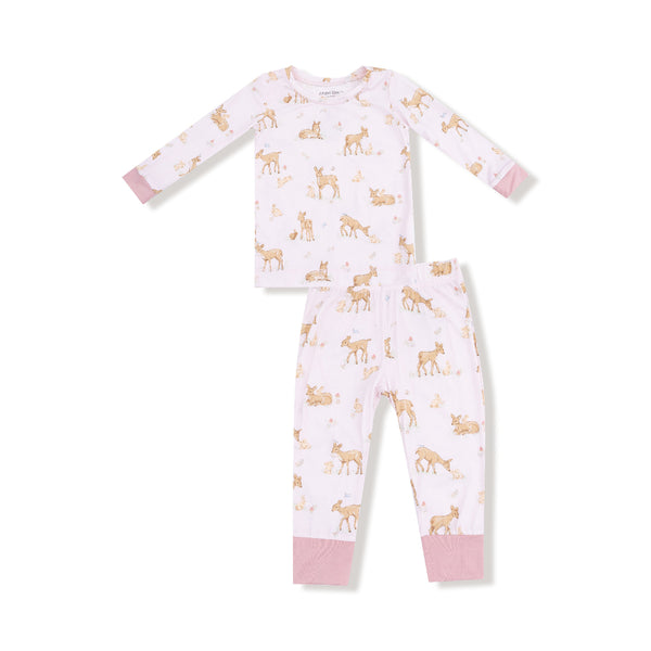 Two-piece pink children’s loungewear set with fawn and bunny forest print, featuring long sleeves and soft mauve cuffs.









