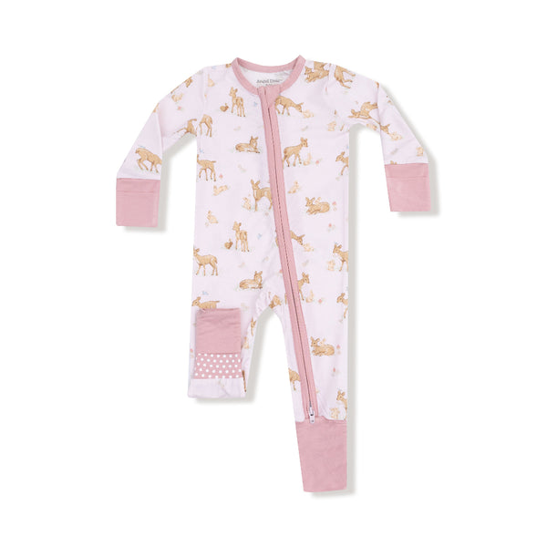 Baby romper with pink background, fawn and bunny print, rose trim, and polka dot foot patches, made from soft bamboo fabric.

