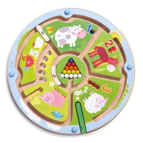 Round magnetic number maze with farm animals and colorful beads guided by an attached stylus.