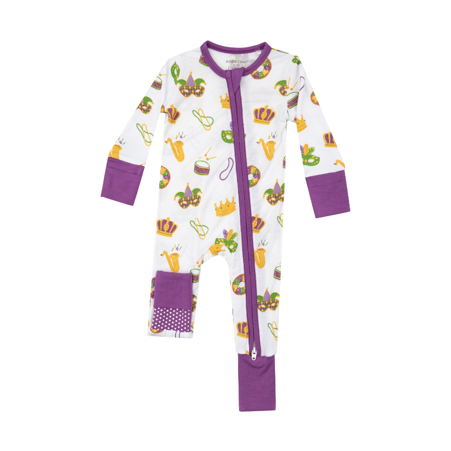 white and purple 2 way zipper romper with mask, beads, saxophone, and drums