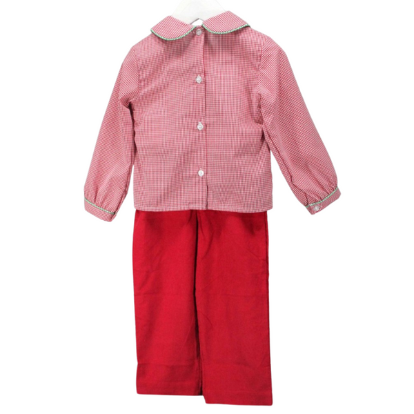 Back view of the boy’s Christmas outfit showing red gingham shirt with button closure and red corduroy pants, displayed on a hanger.

