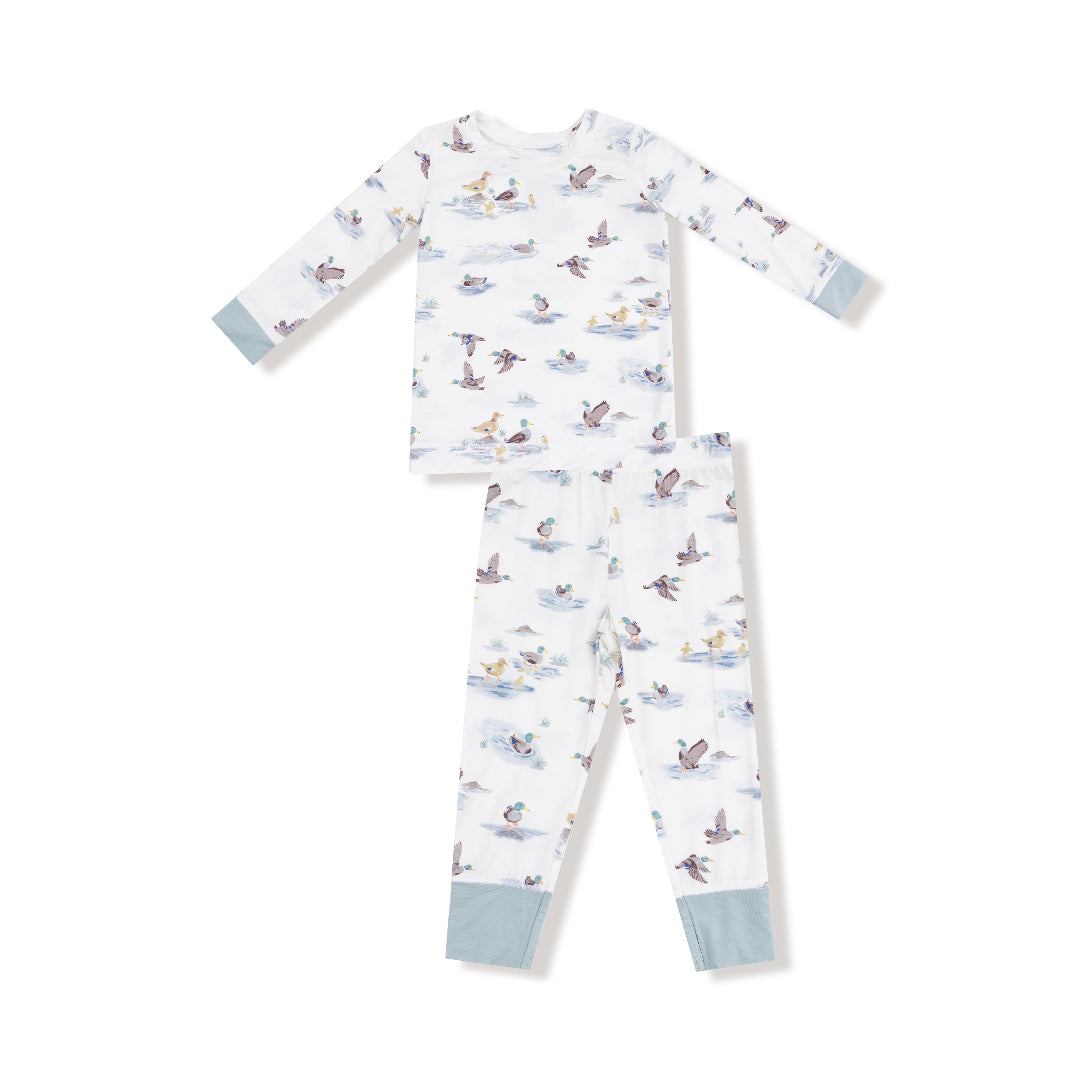 Children’s loungewear set with a migratory mallard duck print, featuring a long-sleeve top and matching pants with blue cuff accents.


