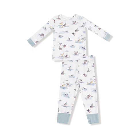Children’s loungewear set with a migratory mallard duck print, featuring a long-sleeve top and matching pants with blue cuff accents.


