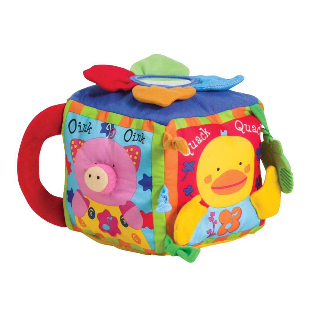 Colorful plush farmyard activity cube featuring pig and duck characters with musical and sensory elements for baby play.