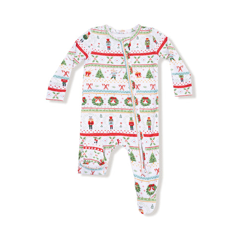 Nutcracker Fair Isle baby footie with festive holiday print and full zipper, featuring toy soldiers, trees, and wreaths on white background.


