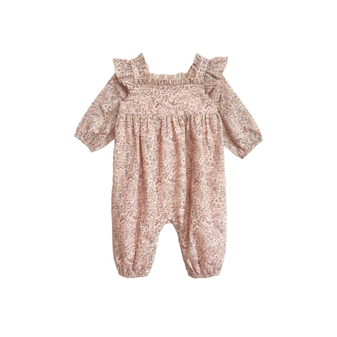 Front view of a pink paisley baby romper featuring ruffle shoulders, long sleeves, and a gathered waist.