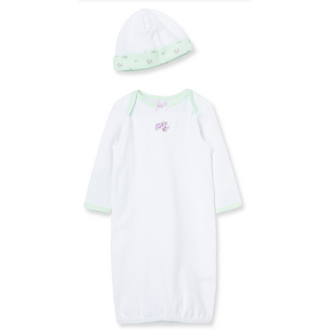 White baby gown with mint trim and tiny rose embroidery, paired with a matching hat featuring rosebud print brim.