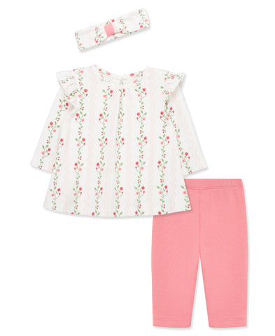 pink and white floral shirt with matching pink pants with a matching floral headband