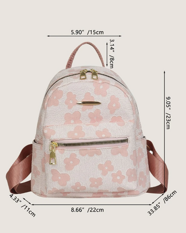 pink backpack with floral design