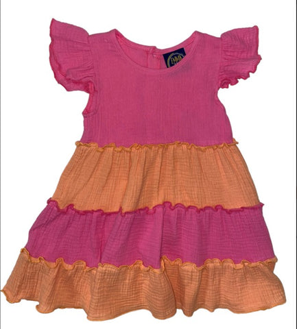 Muslin layered girls dress with flutter sleeve in layers of bright pink and orange.