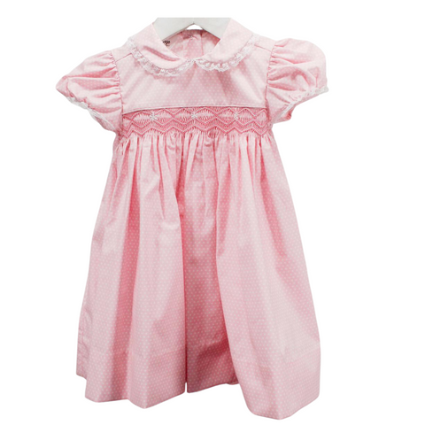 Traditional style empire waist smocked bodice dress in a soft small pink and white dot fabric and lace trimmed collar and short sleeves