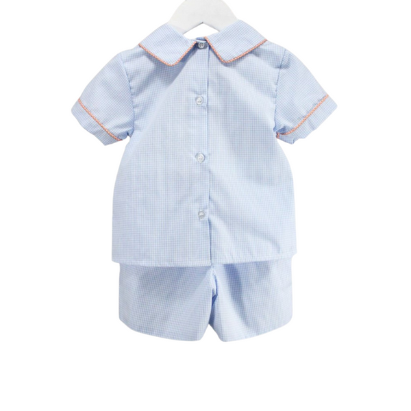 Back view of the boy's fall outfit showing button closure on the shirt and elastic waistband shorts.