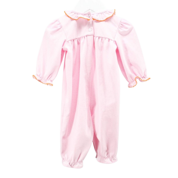 Back view of a pink baby romper with a ruffled collar and elastic cuffs, showing a button closure at the neck.
