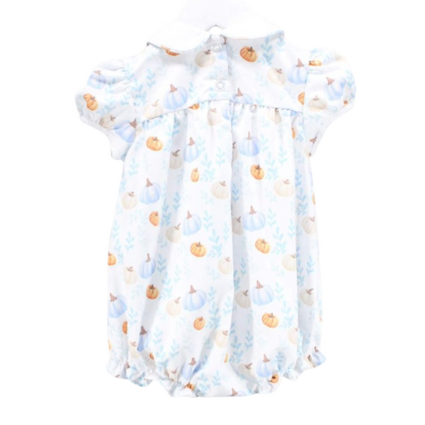 Back view of the same romper showing button closure and allover pumpkin and leaf pattern.