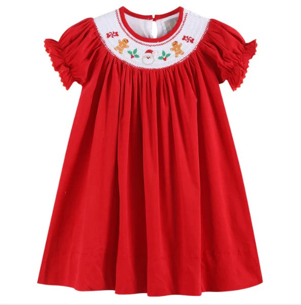 Front view of a red velvet Christmas bishop dress featuring puff sleeves and a white smocked neckline with festive embroidered designs.