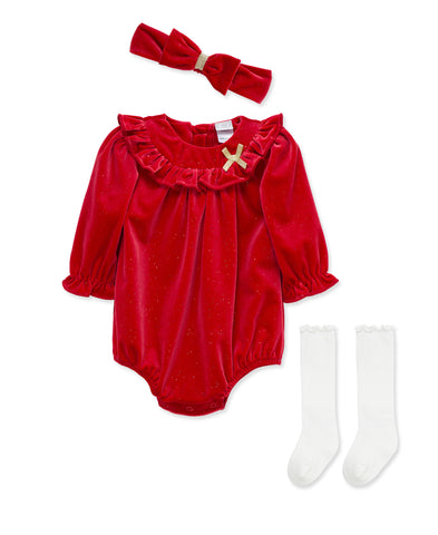 red bubble with a little gold bow at the top with a matching headband and knee high white socks